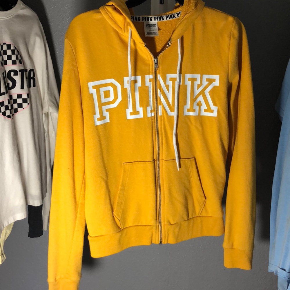 Pink zip-up mustard yellow jacket